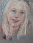 Un pastel d'une fillette, sur un  grand carton.